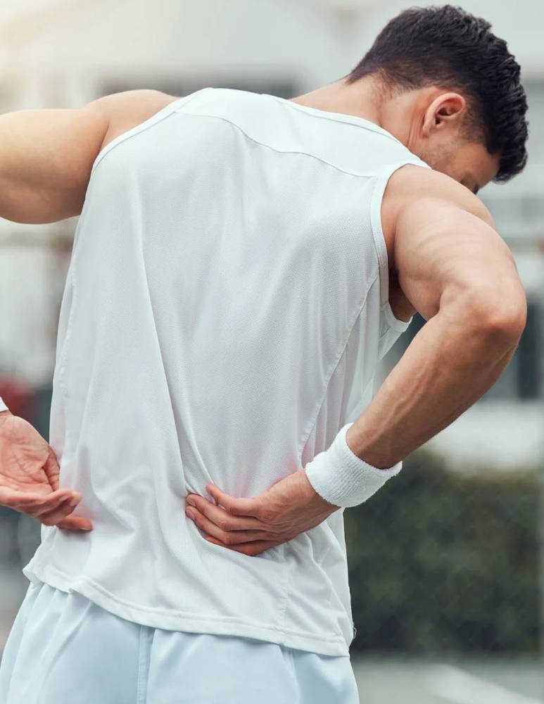 Athlete with low back pain at High Point Chiropractic in Superior, Colorado